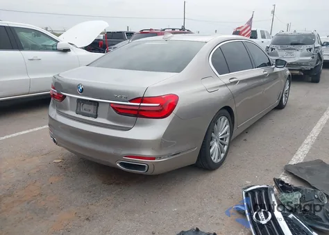 2016 BMW 740I из США, поврежденный, VIN WBA7E2C53GG547605